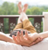 man relaxing on balcony